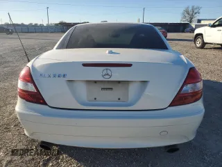 2007 Mercedes-Benz SLK-Class 3.0L with VIN WDBWK54F27F163187, listed as a Copart auction lot 80689934 with 183,188 mi miles and Salvage Title. Bid and sale history available at carsss.com. Image 6.