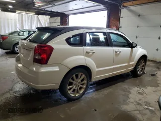 2011 Dodge Caliber Heat z VIN 1B3CB5HA6BD222153, wystawiony jako Copart lot #56881205 z przebiegiem 153 950 mil mil oraz Szkody całkowita. Historia ofert i sprzedaży dostępna na DreamBid. Obrazek 3.