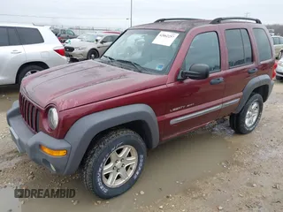 2002 Jeep Liberty Sport with VIN 1J4GL48K12W270609, listed as a IAAI auction lot 42062257 with 120,667 mi miles. Bid and sale history available at carsss.com. Image 2.