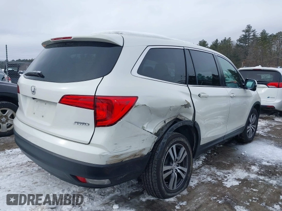 2017 Honda Pilot EX-L with VIN 5FNYF6H52HB015651, listed as a IAAI auction lot 41538814 with 121,433 mi miles and . Bid and sale history available at DreamBid. Image 4.