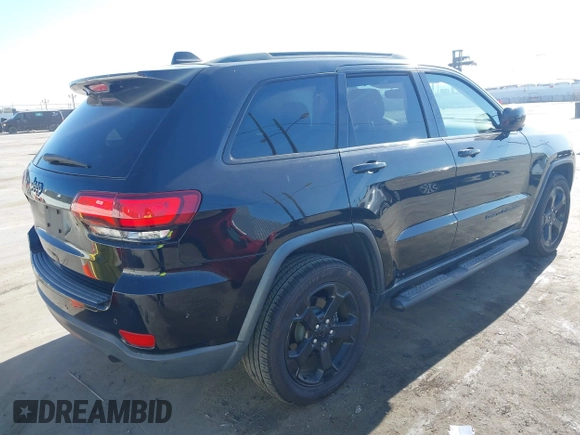 2018 Jeep Grand Cherokee Laredo E with VIN 1C4RJFAG4JC367924, listed as a IAAI auction lot 42065114 with 65,250 mi miles. Bid and sale history available at carsss.com. Image 4.