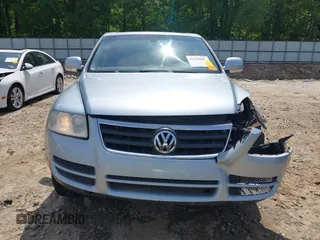 2007 Volkswagen Touareg V6 z VIN WVGZE77L57D000964, wystawiony jako IAAI lot #42159667 z przebiegiem 143 542 mil mil oraz . Historia ofert i sprzedaży dostępna na DreamBid. Obrazek 12.