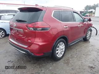 2018 Nissan Rogue SV with VIN 5N1AT2MT7JC810880, listed as a IAAI auction lot 41084997 with 98,719 mi miles and . Bid and sale history available at carsss.com. Image 4.