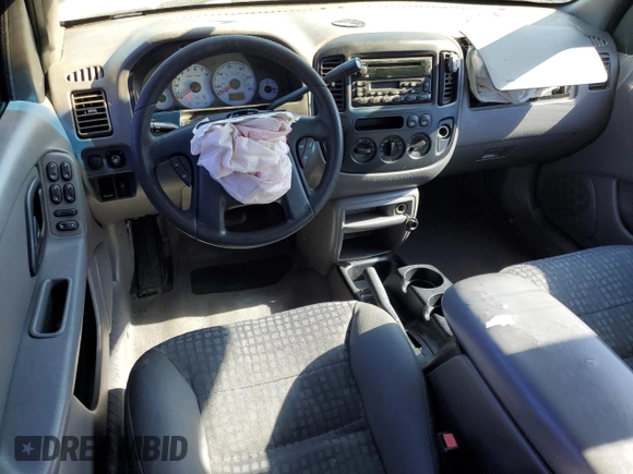 2002 Ford Escape XLS Choice with VIN 1FMYU01142KD48997, listed as a Copart auction lot 53340815 with 172,235 mi miles and Salvage title. Bid and sale history available at DreamBid. Image 8.