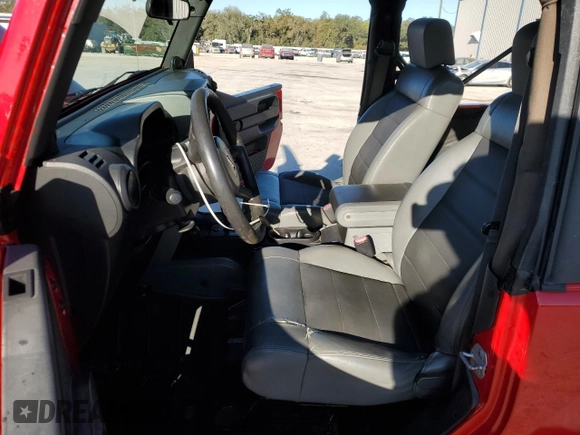 2009 Jeep Wrangler X with VIN 1J4FA24199L720554, listed as a Copart auction lot 88129665 with 67,840 mi miles and Salvage title. Bid and sale history available at DreamBid. Image 7.