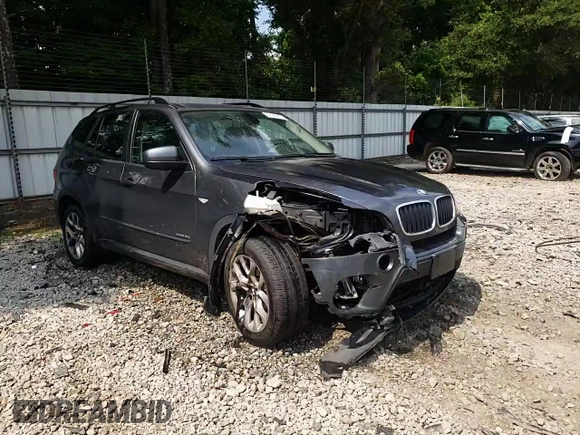 2012 BMW X5 35i z VIN 5UXZV4C55CL753810, wystawiony jako Copart lot #62405565 z przebiegiem 178 504 mil mil oraz Szkoda całkowita • Salvage title. Historia ofert i sprzedaży dostępna na DreamBid. Obrazek 14.