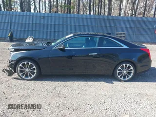 2016 Cadillac ATS Luxury Collection RWD z VIN 1G6AB1RX9G0194349, wystawiony jako IAAI lot #41882442 z przebiegiem 52 676 mil mil oraz . Historia ofert i sprzedaży dostępna na DreamBid. Obrazek 14.