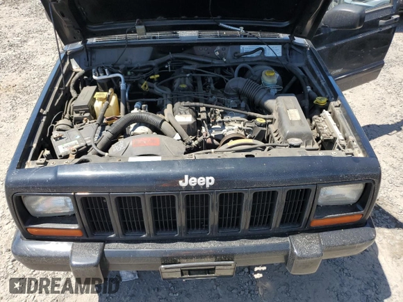 2000 Jeep Cherokee Classic with VIN 1J4FF58S4YL175741, listed as a Copart auction lot 60677205 with Not provided miles and Clean title. Bid and sale history available at DreamBid. Image 12.