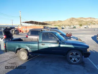 1994 Toyota Pickup with VIN JT4RN81A2R5194383, listed as a IAAI auction lot 41587661 with 262,153 mi miles and . Bid and sale history available at DreamBid. Image 13.