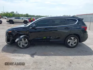 2021 Hyundai Santa Fe SE z VIN 5NMS14AJ0MH332918, wystawiony jako IAAI lot #42365534 z przebiegiem 58 720 mil mil oraz . Historia ofert i sprzedaży dostępna na DreamBid. Obrazek 14.