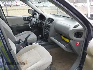 2005 Hyundai Santa Fe GLS with VIN KM8SC73D45U943575, listed as a IAAI auction lot 41676922 with 265,333 mi miles. Bid and sale history available at carsss.com. Image 5.