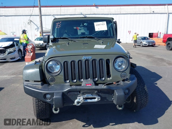 2015 Jeep Wrangler Rubicon Hard Rock with VIN 1C4BJWCGXFL771669, listed as a IAAI auction lot 42057423 with 36,996 mi miles and . Bid and sale history available at DreamBid. Image 13.