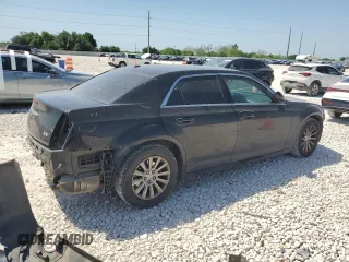 2014 Chrysler 300 with VIN 2C3CCAAG4EH100812, listed as a Copart auction lot 52641955 with 135,337 mi miles and Salvage Title. Bid and sale history available at carsss.com. Image 3.