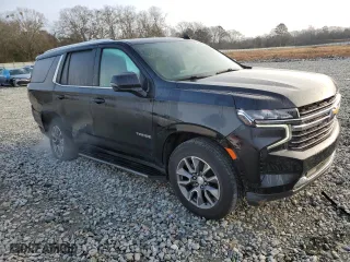 2021 Chevrolet Tahoe LT with VIN 1GNSCNKD8MR147897, listed as a Copart auction lot 43267805 with 65,743 mi miles and Salvage Title. Bid and sale history available at carsss.com. Image 4.