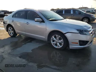 2012 Ford Fusion SE with VIN 3FAHP0HA4CR426943, listed as a Copart auction lot 87314074 with 119,782 mi miles and Salvage Title. Bid and sale history available at carsss.com. Image 4.