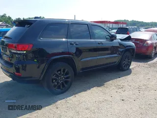 2018 Jeep Grand Cherokee Upland with VIN 1C4RJFAG2JC350975, listed as a IAAI auction lot 42612836 with 148,435 mi miles and . Bid and sale history available at DreamBid. Image 4.