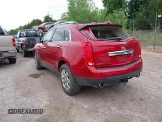 2016 Cadillac SRX Premium Collection z VIN 3GYFNDE37GS525186, wystawiony jako IAAI lot #42179497 z przebiegiem 117 200 mil mil oraz . Historia ofert i sprzedaży dostępna na DreamBid. Obrazek 3.
