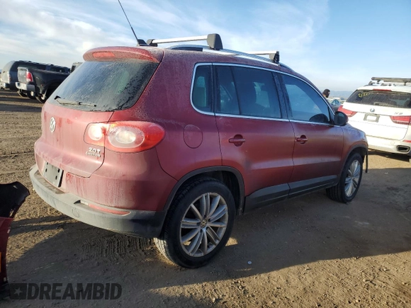 2011 Volkswagen Tiguan SEL with VIN WVGBV7AX4BW001386, listed as a Copart auction lot 44495945 with 149,806 mi miles and Salvage Title. Bid and sale history available at DreamBid. Image 3.