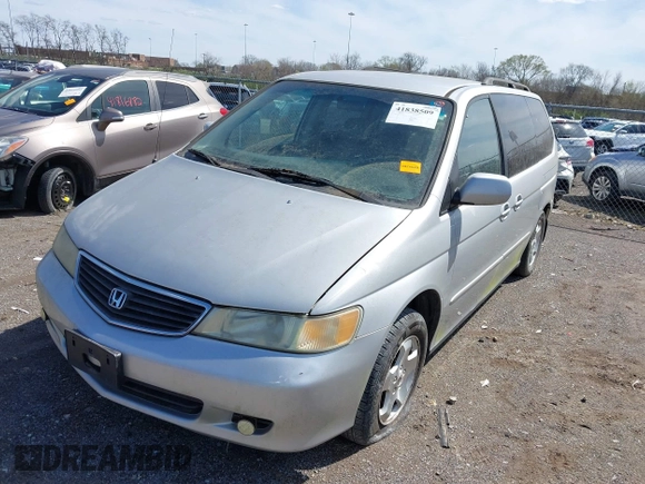 2001 Honda Odyssey EX z VIN 2HKRL18661H597205, wystawiony jako IAAI lot #41838509 z przebiegiem 317 084 mil mil oraz . Historia ofert i sprzedaży dostępna na DreamBid. Obrazek 6.