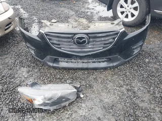 2016 Mazda CX-5 Grand Touring z VIN JM3KE4DY5G0742686, wystawiony jako IAAI lot #41598719 z przebiegiem 117 643 mil mil oraz . Historia ofert i sprzedaży dostępna na DreamBid. Obrazek 12.