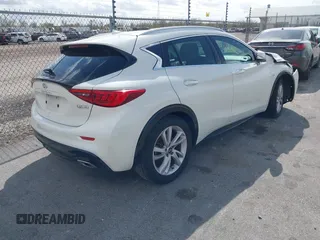 2019 Infiniti QX30 Luxe z VIN SJKCH5CP8KA010331, wystawiony jako IAAI lot #41749668 z przebiegiem 55 486 mil mil oraz . Historia ofert i sprzedaży dostępna na DreamBid. Obrazek 4.