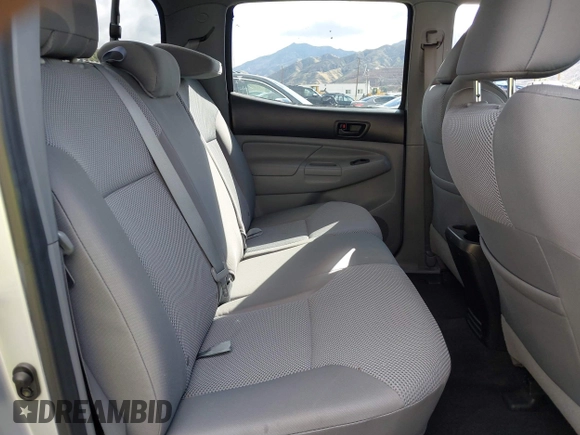 2012 Toyota Tacoma PreRunner with VIN 3TMKU4HN6CM033123, listed as a IAAI auction lot 41478582 with 89,479 mi miles and . Bid and sale history available at DreamBid. Image 8.
