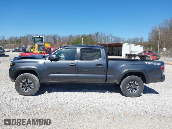 2023 Toyota Tacoma SR5 z VIN 3TMDZ5BN1PM163714, wystawiony jako IAAI lot #41814446 z przebiegiem 14 069 mil mil oraz . Historia ofert i sprzedaży dostępna na DreamBid. Obrazek 15.