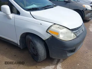 2008 Nissan Versa 1.8 S with VIN 3N1BC11E38L392277, listed as a IAAI auction lot 41927976 with 135,795 mi miles. Bid and sale history available at carsss.com. Image 6.