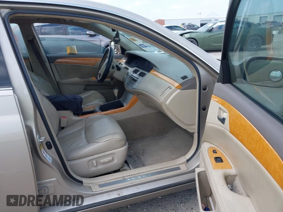 2005 Toyota Avalon XL with VIN 4T1BK36B15U007967, listed as a IAAI auction lot 42060604 with 286,766 mi miles and . Bid and sale history available at DreamBid. Image 5.