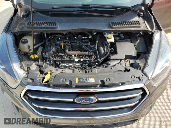 2019 Ford Escape SE z VIN 1FMCU0GD9KUA52728, wystawiony jako Copart lot #58410975 z przebiegiem 109 483 mil mil oraz Czysty tytuł • Clean title. Historia ofert i sprzedaży dostępna na DreamBid. Obrazek 12.