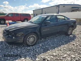 1999 Pontiac Grand Am SE2 with VIN 1G2NE52E2XM732523, listed as a Copart auction lot 75420684 with 124,110 mi miles and Salvage Title. Bid and sale history available at carsss.com. Image 1.