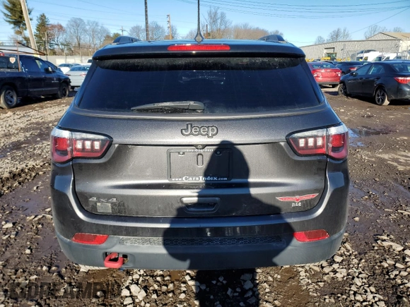 2019 Jeep Compass Trailhawk with VIN 3C4NJDDB5KT775860, listed as a Copart auction lot 48113695 with 76,091 mi miles and Salvage Title. Bid and sale history available at DreamBid. Image 6.