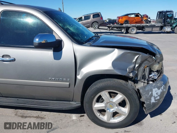 2007 Chevrolet Tahoe LTZ with VIN 1GNFC13J97R155705, listed as a IAAI auction lot 40914171 with 165,727 mi miles and . Bid and sale history available at DreamBid. Image 12.