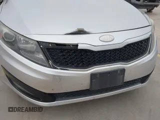2013 Kia Optima LX with VIN KNAGM4A79D5377485, listed as a IAAI auction lot 41290306 with 172,253 mi miles. Bid and sale history available at carsss.com. Image 20.