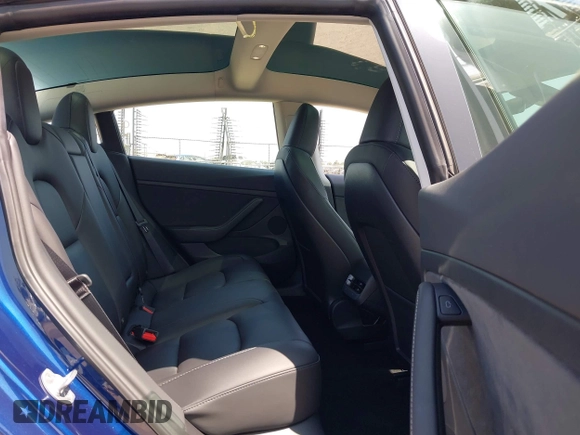 2023 Tesla Model 3 z VIN 5YJ3E1EA6PF547209, wystawiony jako IAAI lot #42511077 z przebiegiem 6 125 mil mil oraz . Historia ofert i sprzedaży dostępna na DreamBid. Obrazek 8.