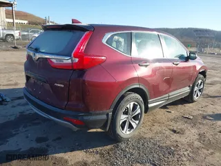 2019 Honda CR-V LX with VIN 2HKRW6H34KH210131, listed as a IAAI auction lot 41776685 with 75,339 mi miles. Bid and sale history available at carsss.com. Image 4.