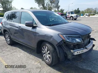 2020 Honda Pilot EX-L z VIN 5FNYF6H50LB047202, wystawiony jako IAAI lot #42117776 z przebiegiem 119 726 mil mil oraz . Historia ofert i sprzedaży dostępna na DreamBid. Obrazek 1.