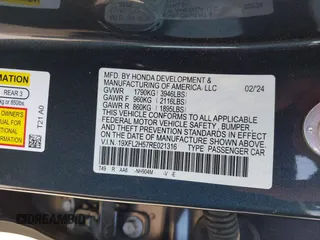 2024 Honda Civic LX z VIN 19XFL2H57RE021316, wystawiony jako IAAI lot #42031580 z przebiegiem 18 598 mil mil oraz . Historia ofert i sprzedaży dostępna na DreamBid. Obrazek 9.