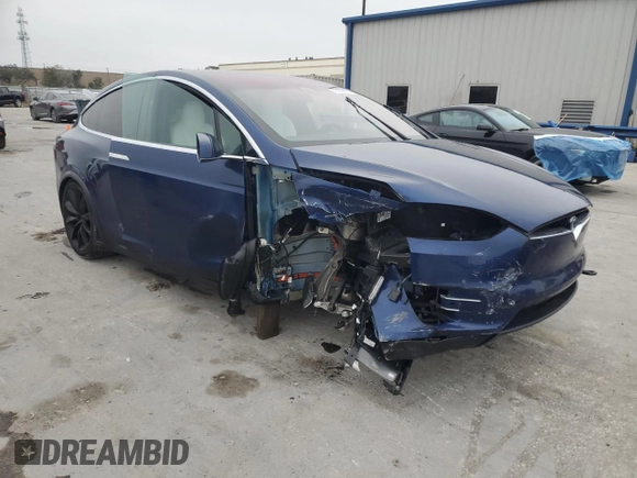 2020 Tesla Model X Long Range with VIN 5YJXCBE2XLF250234, listed as a Copart auction lot 42236365 with 63,401 mi miles and Non Repairable. Bid and sale history available at carsss.com. Image 4.
