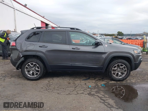 2022 Jeep Cherokee Trailhawk with VIN 1C4PJMBX6ND505196, listed as a IAAI auction lot 41536316 with 9,976 mi miles. Bid and sale history available at carsss.com. Image 13.