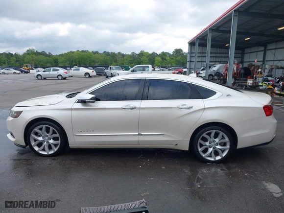 2014 Chevrolet Impala LTZ with VIN 1G1155S38EU105260, listed as a IAAI auction lot 42012082 with 230,407 mi miles. Bid and sale history available at carsss.com. Image 14.