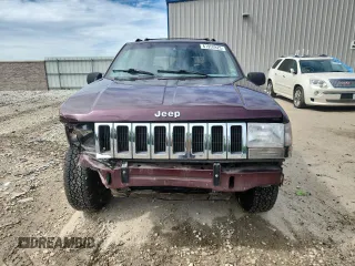 1994 Jeep Grand Cherokee Laredo z VIN 1J4GZ58S0RC221854, wystawiony jako Copart lot #61950825 z przebiegiem 69 465 mil mil oraz Czysty tytuł • Clean title. Historia ofert i sprzedaży dostępna na DreamBid. Obrazek 5.