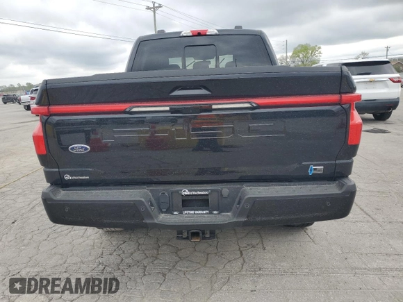 2023 Ford F-150 Lightning Pro z VIN 1FTVW1EV4PWG12935, wystawiony jako Copart lot #52685485 z przebiegiem Nie podano mil oraz Szkody całkowita. Historia ofert i sprzedaży dostępna na DreamBid. Obrazek 6.