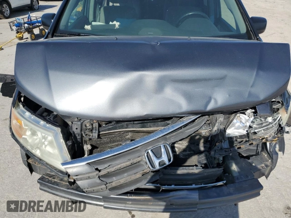 2013 Honda Odyssey LX z VIN 5FNRL5H26DB058364, wystawiony jako Copart lot #52984905 z przebiegiem 165 779 mil mil oraz Szkoda całkowita • Salvage title. Historia ofert i sprzedaży dostępna na DreamBid. Obrazek 13.