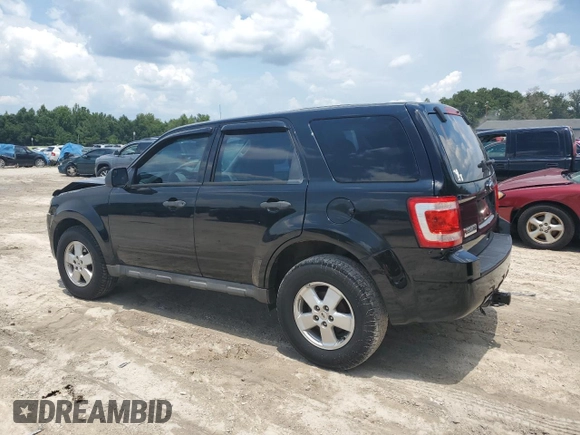 2010 Ford Escape XLS with VIN 1FMCU0C71AKC97243, listed as a Copart auction lot 63966335 with 156,065 mi miles and Non repairable. Bid and sale history available at DreamBid. Image 2.