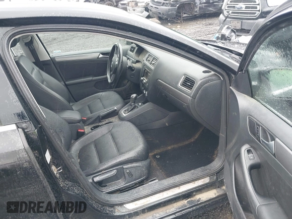 2014 Volkswagen Jetta TDI w/Premium with VIN 3VWLL7AJ1EM406360, listed as a IAAI auction lot 41857580 with 93,333 mi miles and . Bid and sale history available at DreamBid. Image 5.