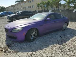 2013 BMW 6 Series 640i with VIN WBA6A0C58DDZ03250, listed as a Copart auction lot 52081974 with 146,345 mi miles and Salvage Title. Bid and sale history available at DreamBid. Image 1.