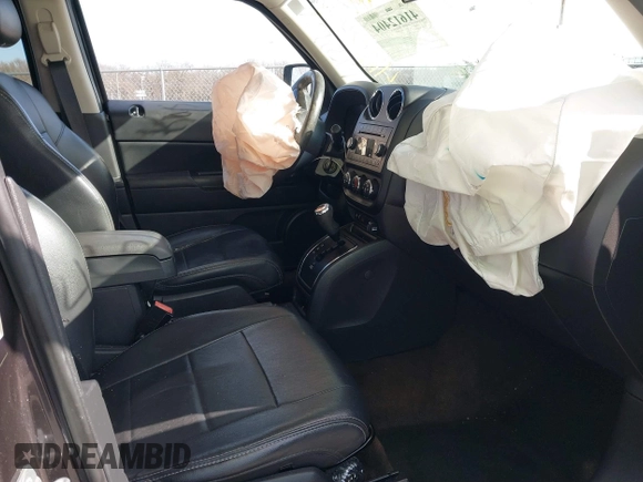 2015 Jeep Patriot Latitude with VIN 1C4NJRFB0FD245169, listed as a IAAI auction lot 41612404 with 68,065 mi miles and . Bid and sale history available at DreamBid. Image 5.