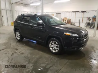 2014 Jeep Cherokee Latitude with VIN 1C4PJMCS2EW150793, listed as a Copart auction lot 51015735 with 134,757 mi miles and Non Repairable. Bid and sale history available at carsss.com. Image 4.
