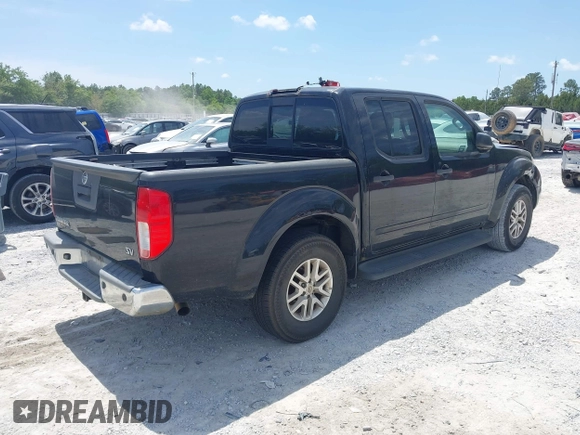 2014 Nissan Frontier SV with VIN 1N6AD0ER8EN725739, listed as a IAAI auction lot 42081008 with 279,407 mi miles and . Bid and sale history available at DreamBid. Image 4.